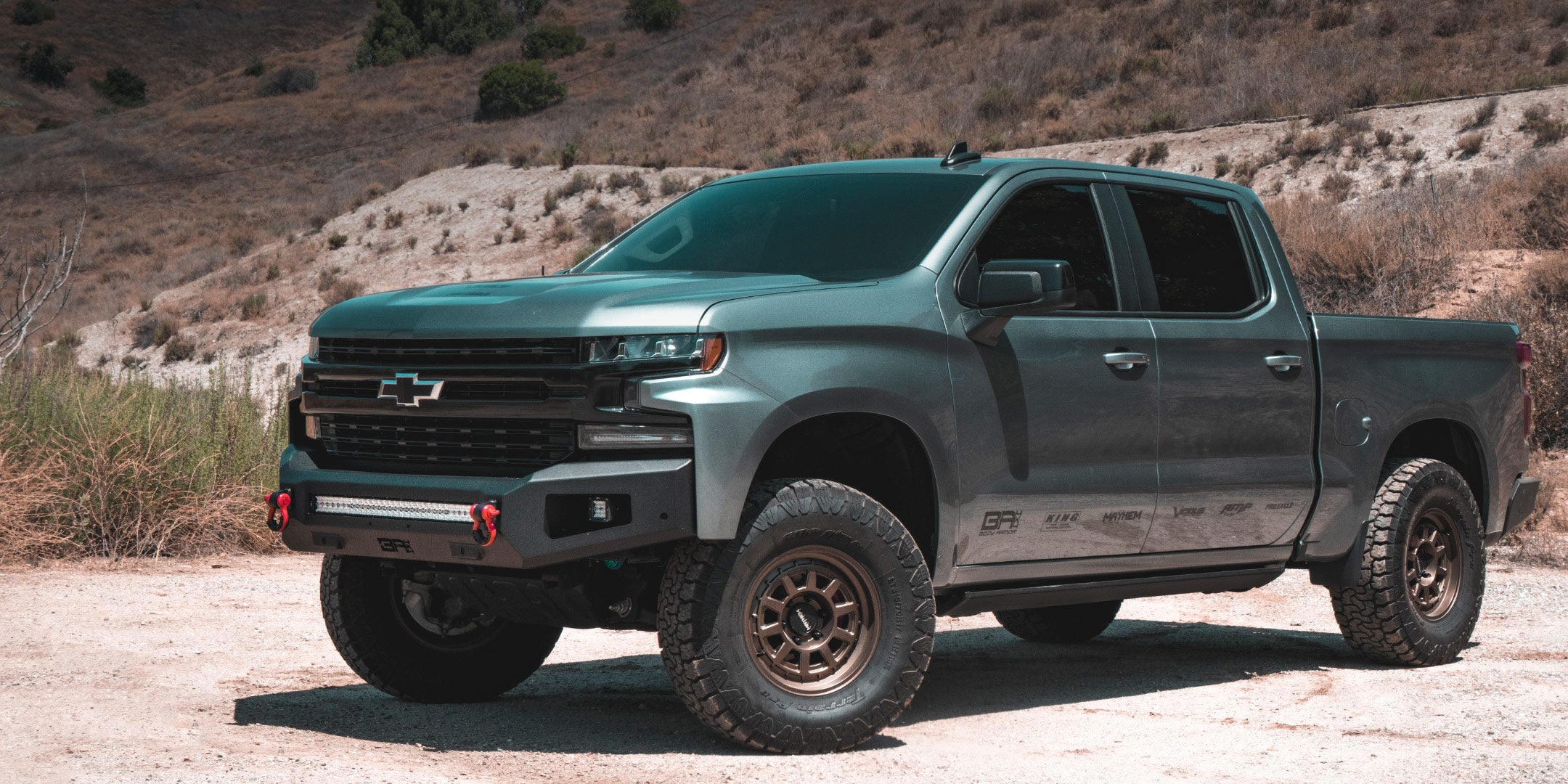 Chevrolet Silverado 1500 with Body Armor 4x4 Ambush front bumper, Body Armor 4x4 D-rings, light bars and light cubes.